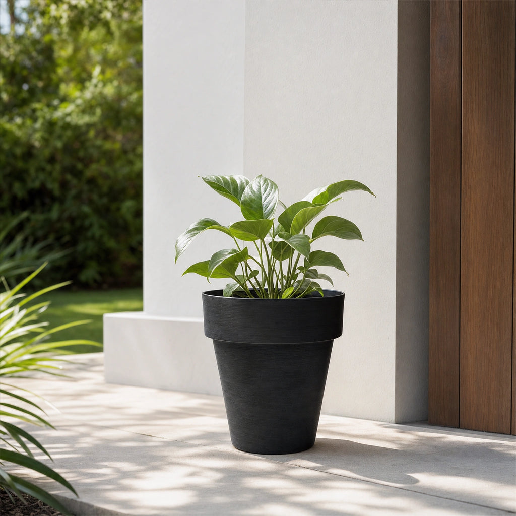 Respect Black 30cm Time Planter – modern black plastic pot for contemporary indoor and outdoor garden styling.