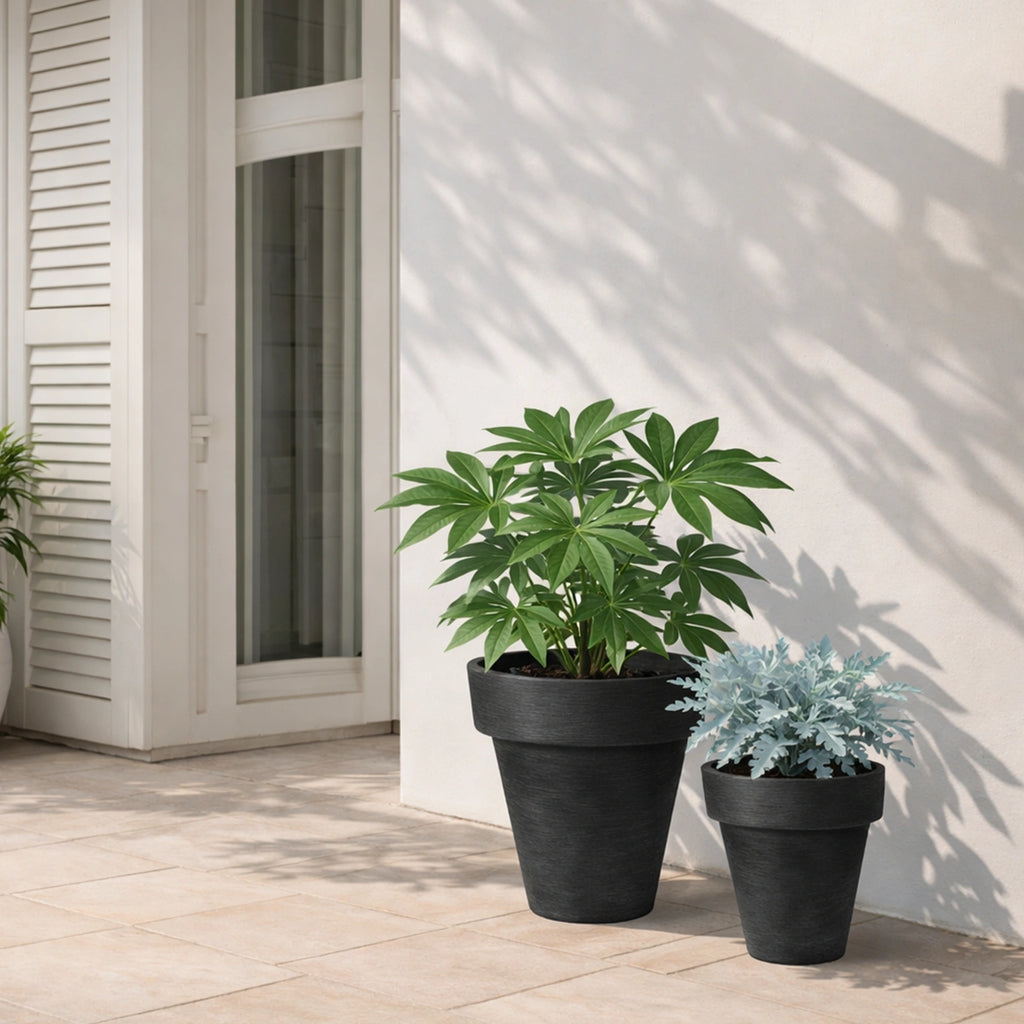 Respect Black 30cm Time Planter – modern black plastic pot for contemporary indoor and outdoor garden styling.