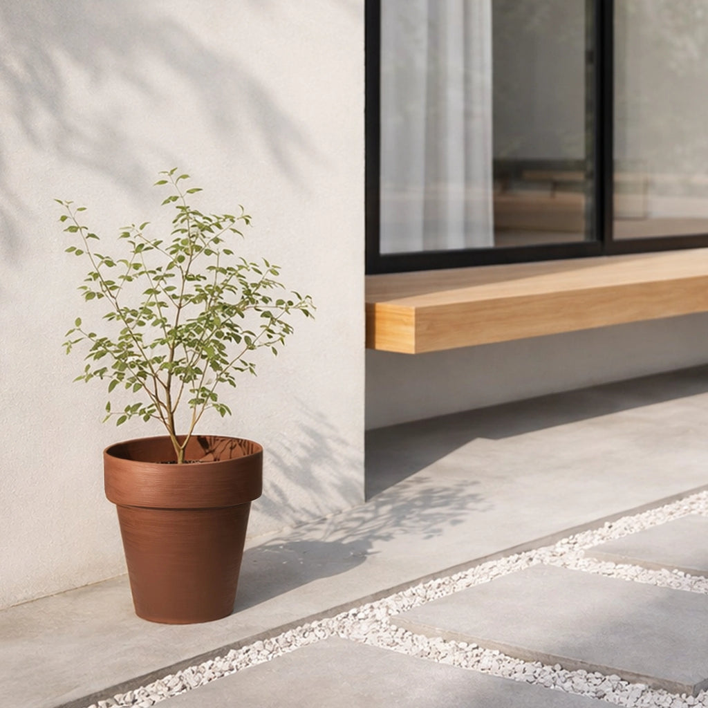 Respect Brown 30cm Terracotta Time Planter with Wheels – moveable terracotta-look plastic planter on wheels for patios.