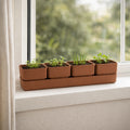 Respect Brown 38cm Terracotta Quad Square Planter with Saucer – terracotta-look square planter with matching saucer for patio plants.