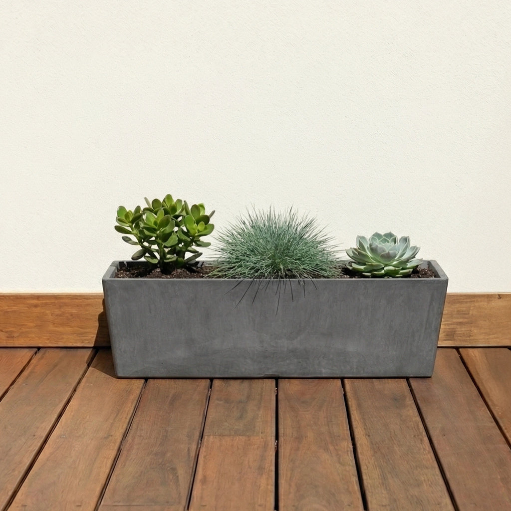 Respect Dark Grey 55cm Green Earth Trough – eco-friendly dark grey plastic trough planter for outdoor herb and flower gardens.