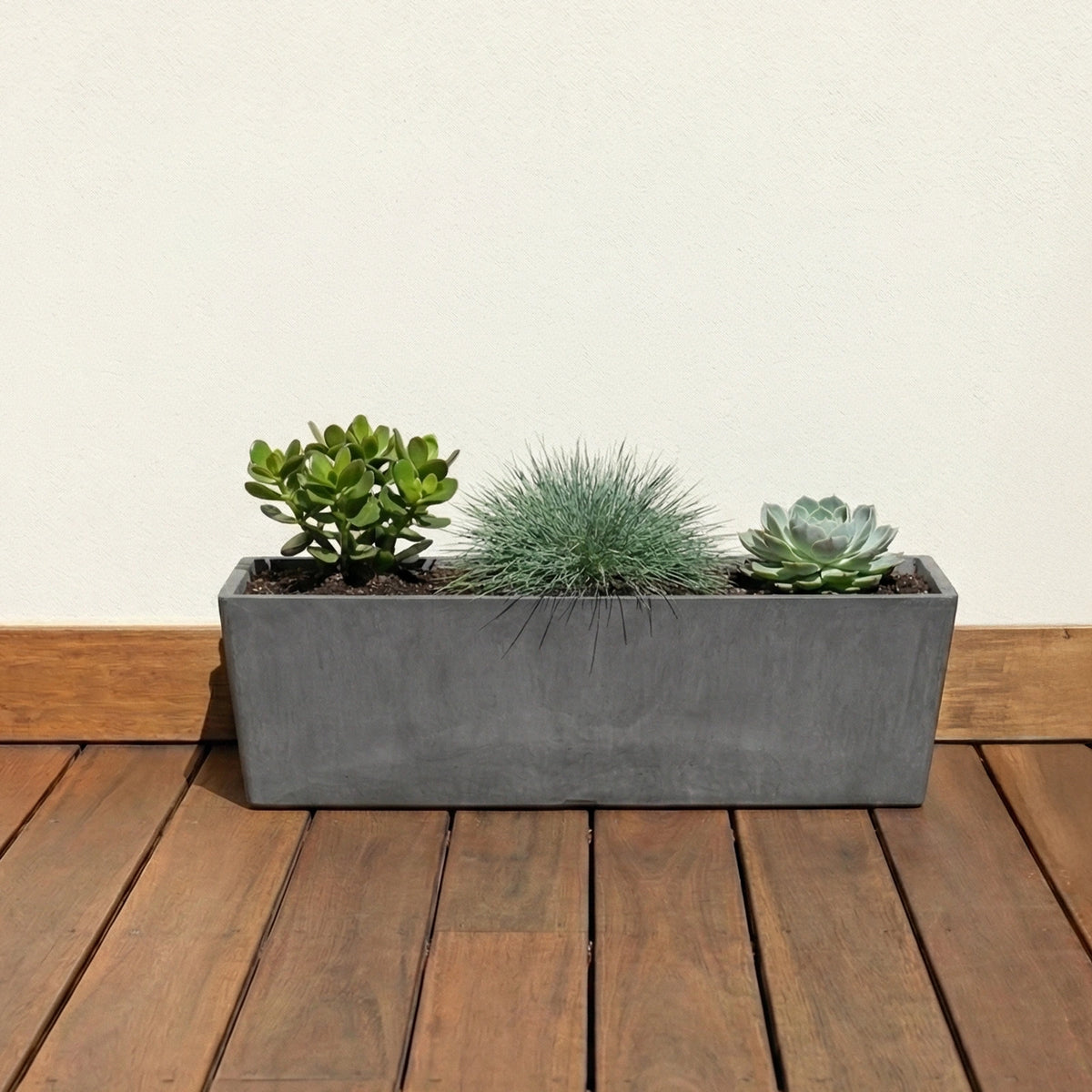 Respect Dark Grey 55cm Green Earth Trough – eco-friendly dark grey plastic trough planter for outdoor herb and flower gardens.